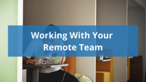 man working on laptop in public space with text overlay reading "working with your remote team"