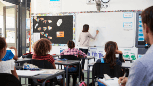 teacher in front of classroom of students