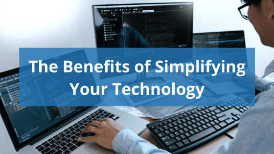 image of man using multiple computers with text that reads "The Benefits of Simplifying Your Technology"